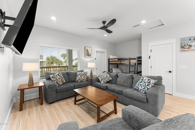 living room featuring recessed lighting, visible vents, light wood-style flooring, attic access, and baseboards