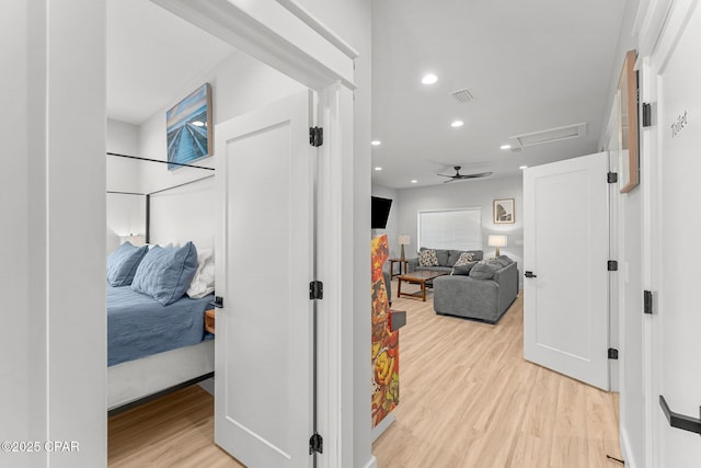 7026 Thomas Dr Unit A & B, Panama City Beach, FL 32408 - hall with light wood finished floors, attic access, and recessed lighting