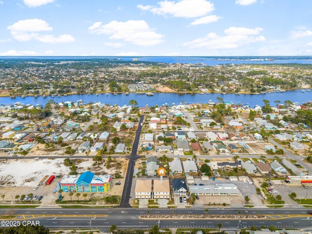 bird's eye view with a water view and a residential view