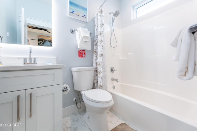 full bathroom with vanity, toilet, and shower / tub combo with curtain