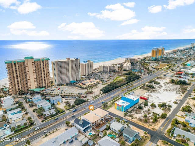 birds eye view of property featuring a view of city and a water view