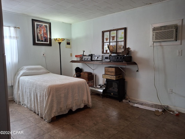 tiled bedroom featuring a wall mounted AC