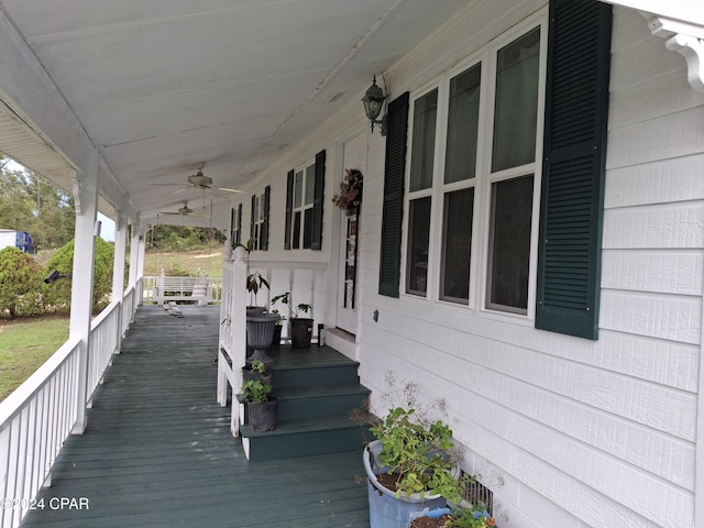 wooden terrace with ceiling fan