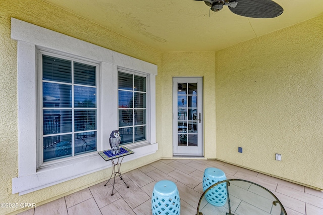 view of patio / terrace featuring a ceiling fan