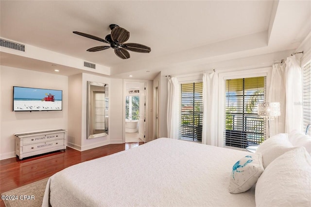 bedroom with access to exterior, dark hardwood / wood-style floors, ensuite bath, and ceiling fan