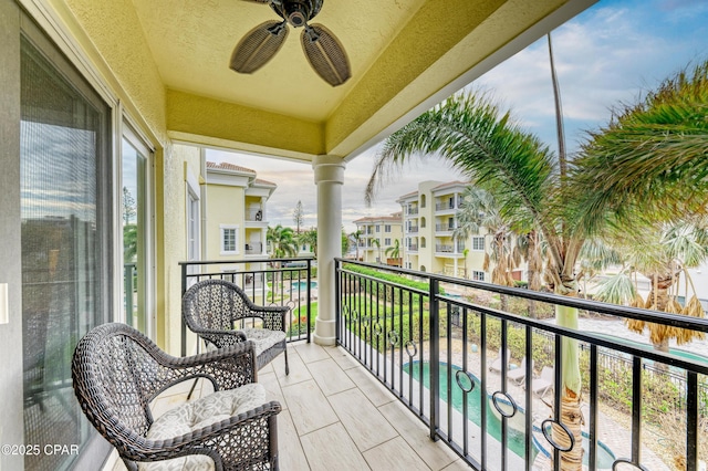 balcony featuring ceiling fan