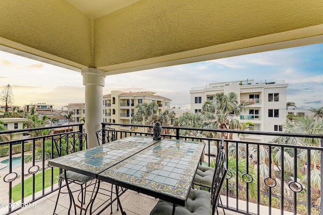 balcony with outdoor dining area