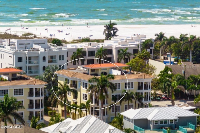 aerial view featuring a beach view and a water view