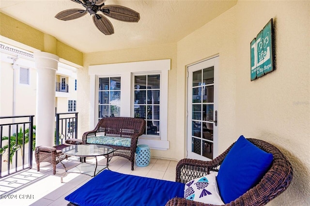 balcony featuring ceiling fan