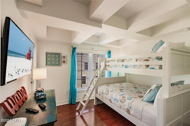 bedroom featuring beam ceiling, dark hardwood / wood-style flooring, and coffered ceiling