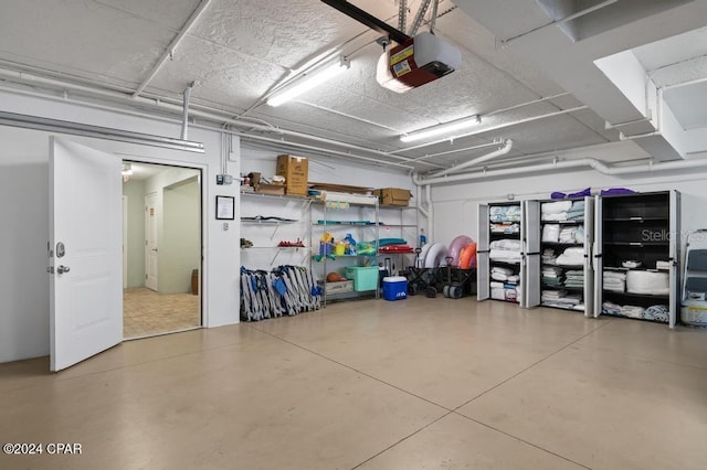 garage featuring a garage door opener