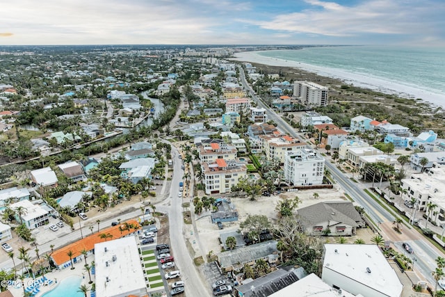 aerial view featuring a view of the beach and a water view