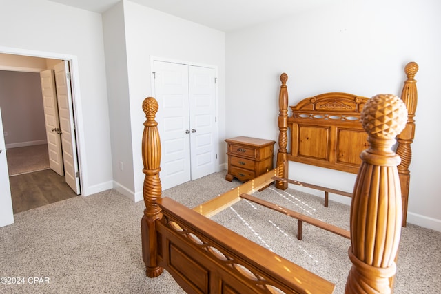 carpeted bedroom featuring a closet