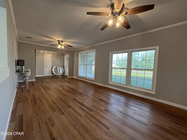 unfurnished living room featuring hardwood / wood-style flooring, ceiling fan, and crown molding