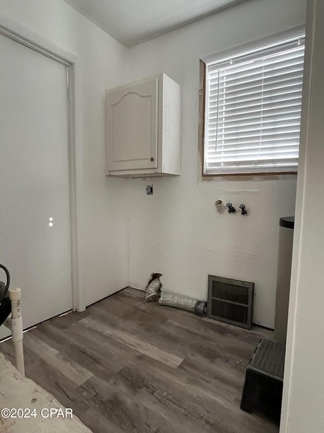 washroom with light wood-type flooring