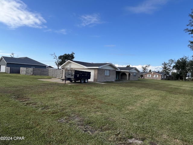 view of yard with a garage