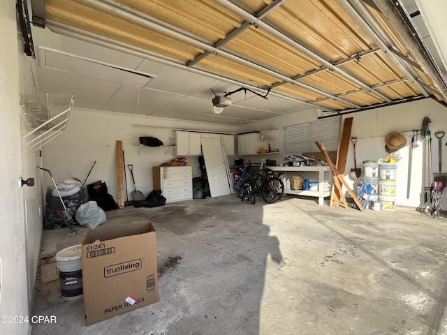 garage featuring a garage door opener