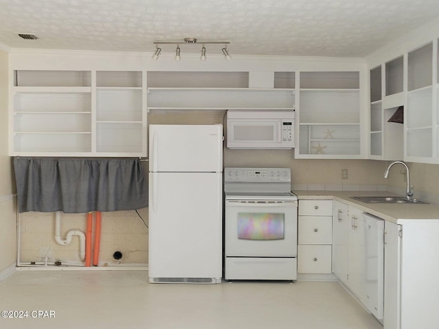 kitchen with a textured ceiling, sink, white cabinets, and white appliances