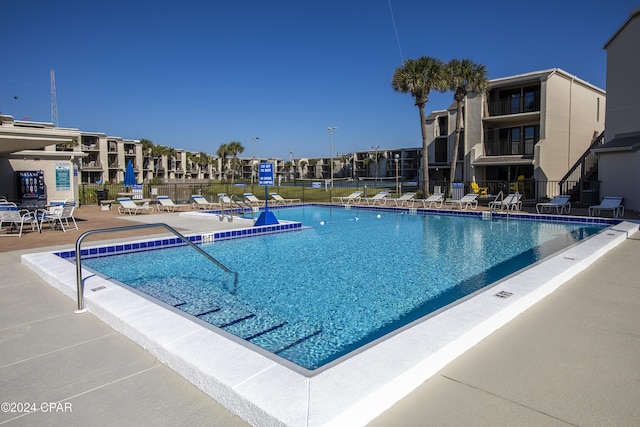 view of pool featuring a patio