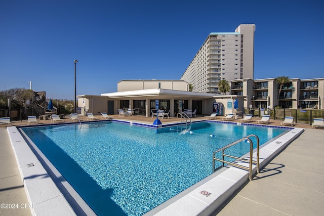 view of pool featuring a patio