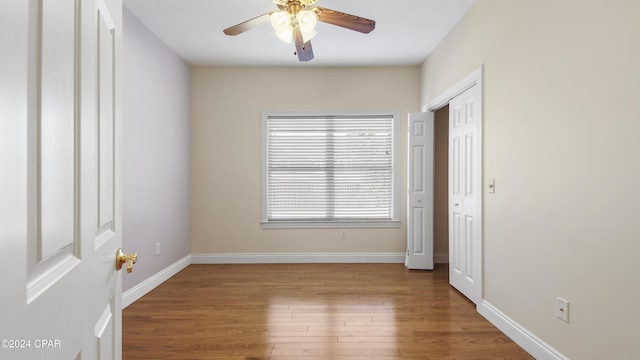 unfurnished bedroom with light hardwood / wood-style flooring and ceiling fan