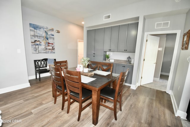 dining area with light hardwood / wood-style flooring