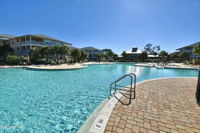 view of pool featuring a patio area