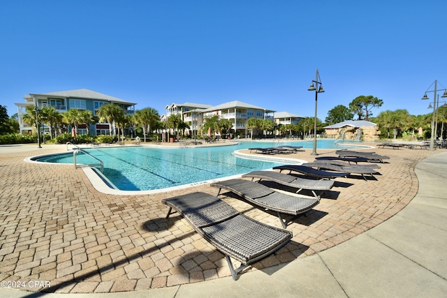 view of pool featuring a patio area