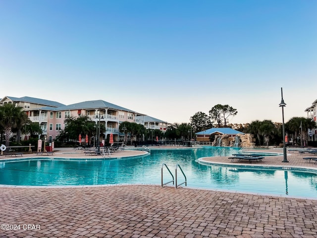 view of pool featuring a patio