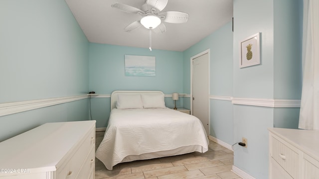 bedroom featuring ceiling fan and light hardwood / wood-style floors