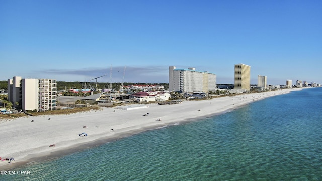 aerial view with a view of the beach and a water view