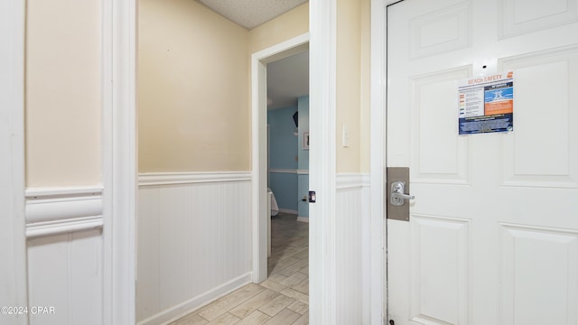 corridor featuring light hardwood / wood-style floors