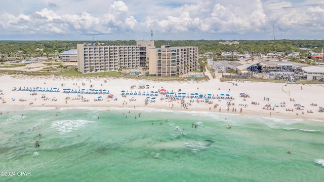 aerial view featuring a view of the beach and a water view