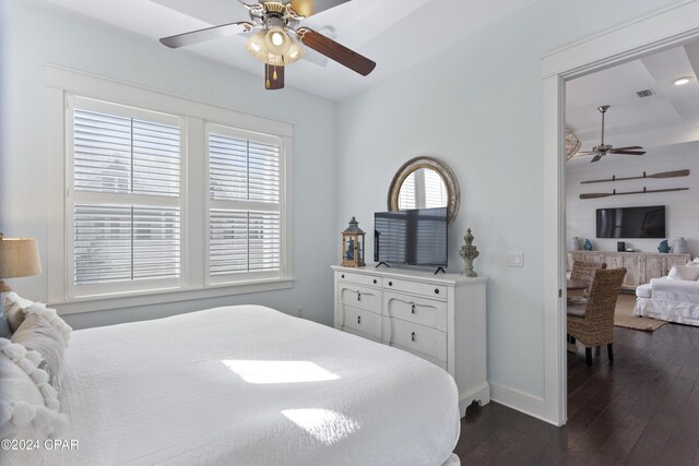 bedroom featuring wood-type flooring and ceiling fan