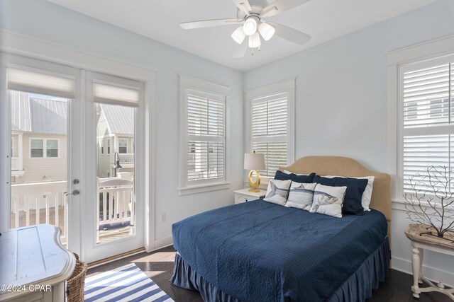 bedroom with ceiling fan and dark wood-type flooring