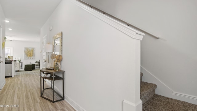 staircase featuring wood-type flooring