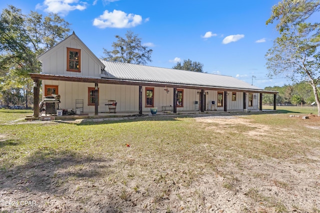 view of front of property with a front lawn and a porch