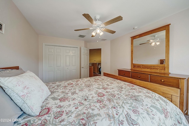 bedroom with ceiling fan and a closet