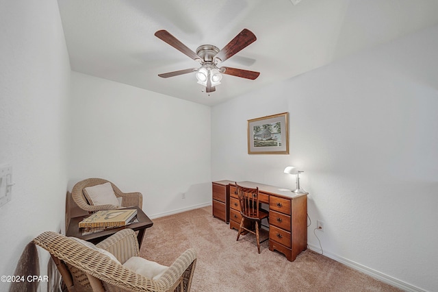 carpeted office with ceiling fan