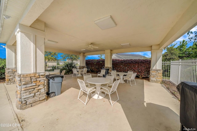 view of patio / terrace featuring ceiling fan and grilling area