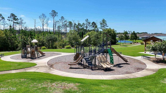 view of jungle gym with a lawn