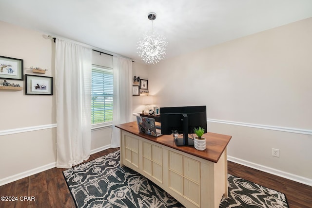 home office featuring dark hardwood / wood-style flooring and a chandelier