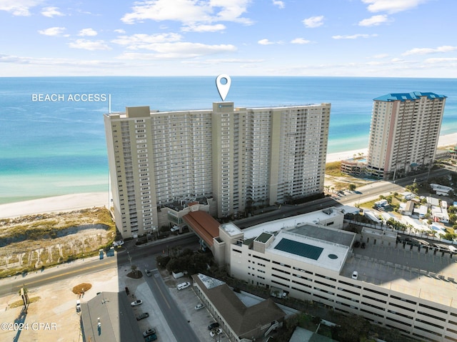 bird's eye view with a beach view and a water view