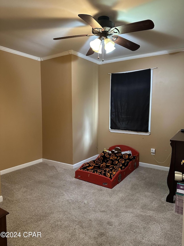 unfurnished bedroom featuring ceiling fan, carpet, and ornamental molding