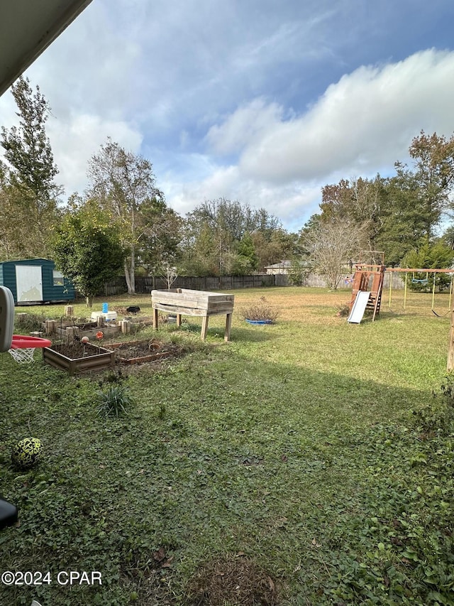 view of yard with a playground