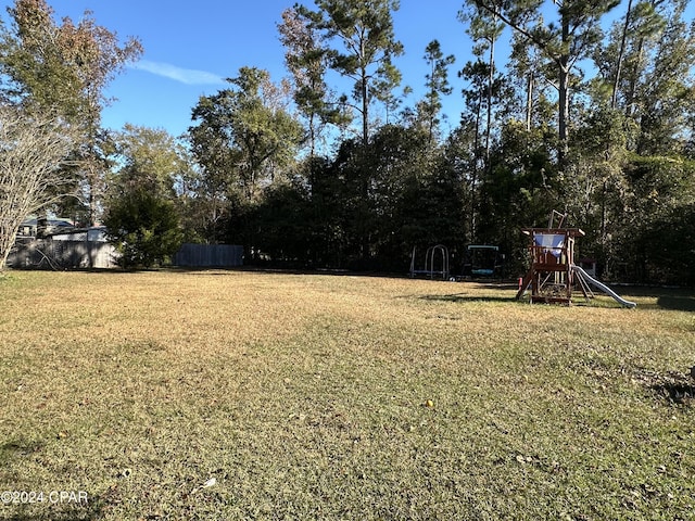 view of yard with a playground