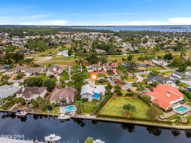 drone / aerial view with a water view