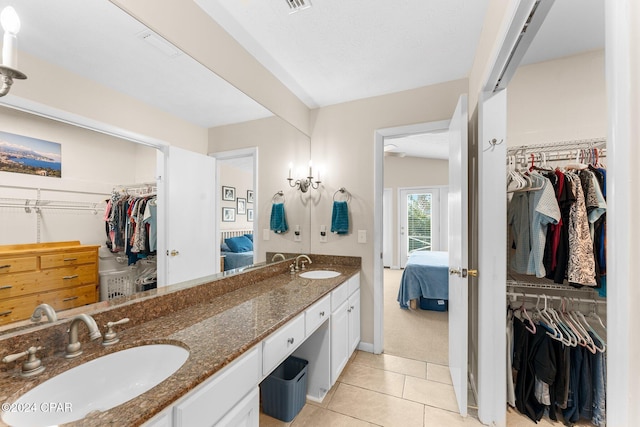 bathroom featuring vanity and tile patterned floors