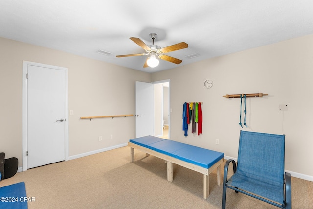 playroom featuring ceiling fan and carpet floors