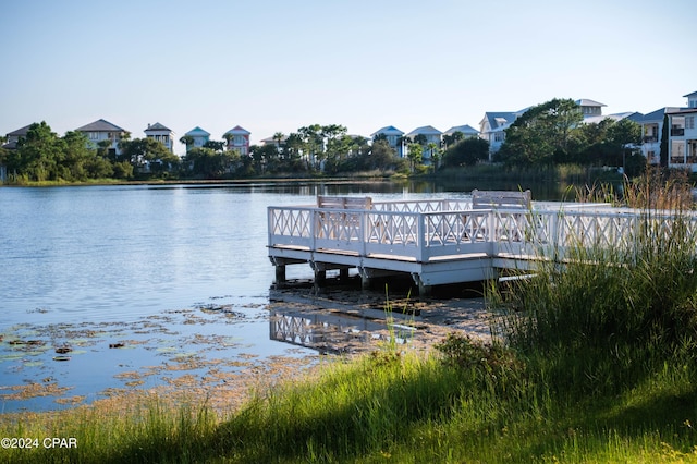 view of dock with a water view